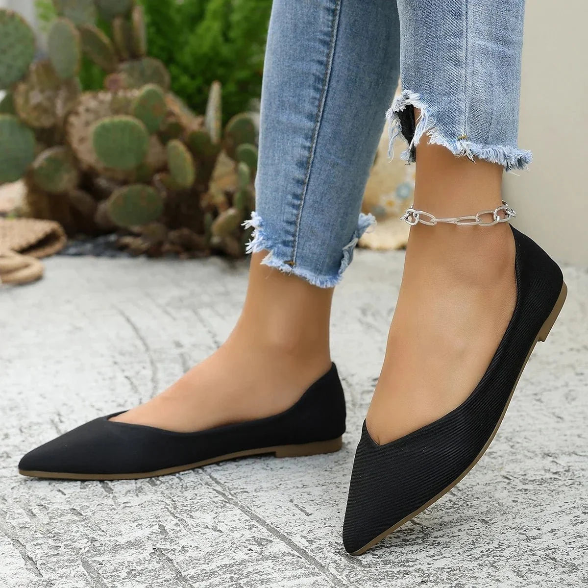 Plus size women's lightweight slip-on ballet flats by TrendLux Wear, showing beige fabric uppers and comfortable flat soles.