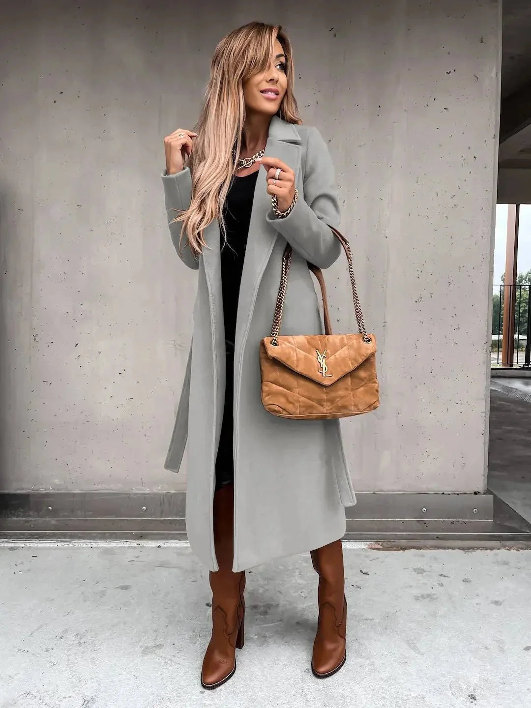 Women's solid woolen lapel coat by TrendLux Wear, featuring a classic outerwear design with a tailored fit and lapel collar.