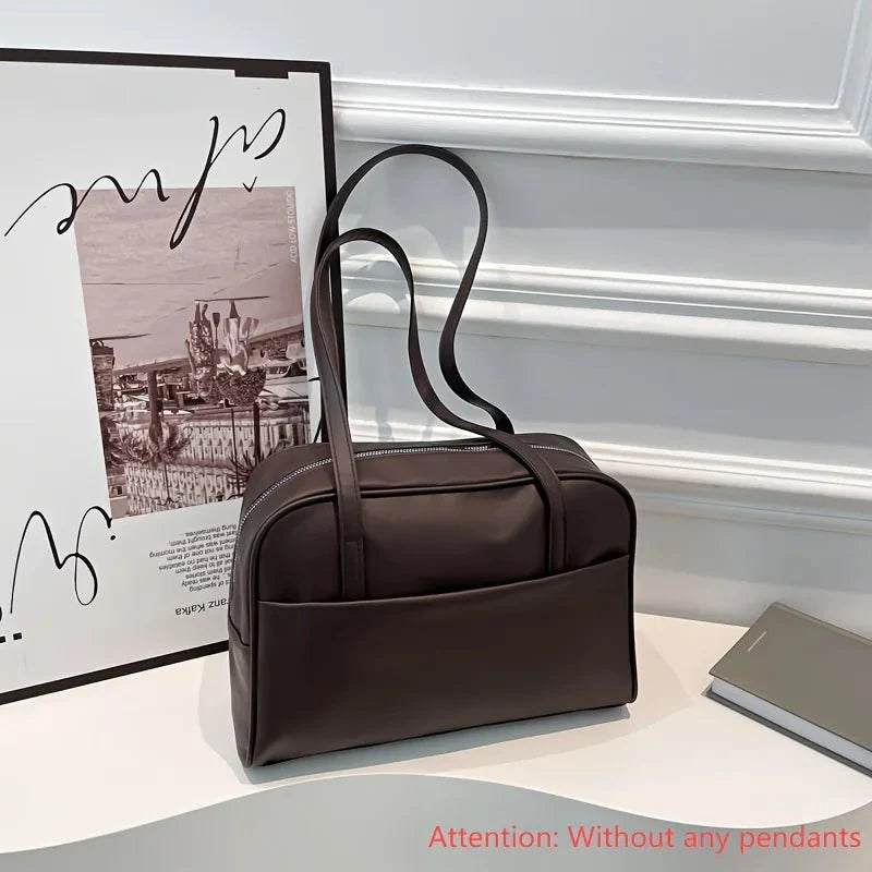 Women's vintage large capacity handbag by TrendLux Wear, versatile design with multiple compartments and stylish leather finish.