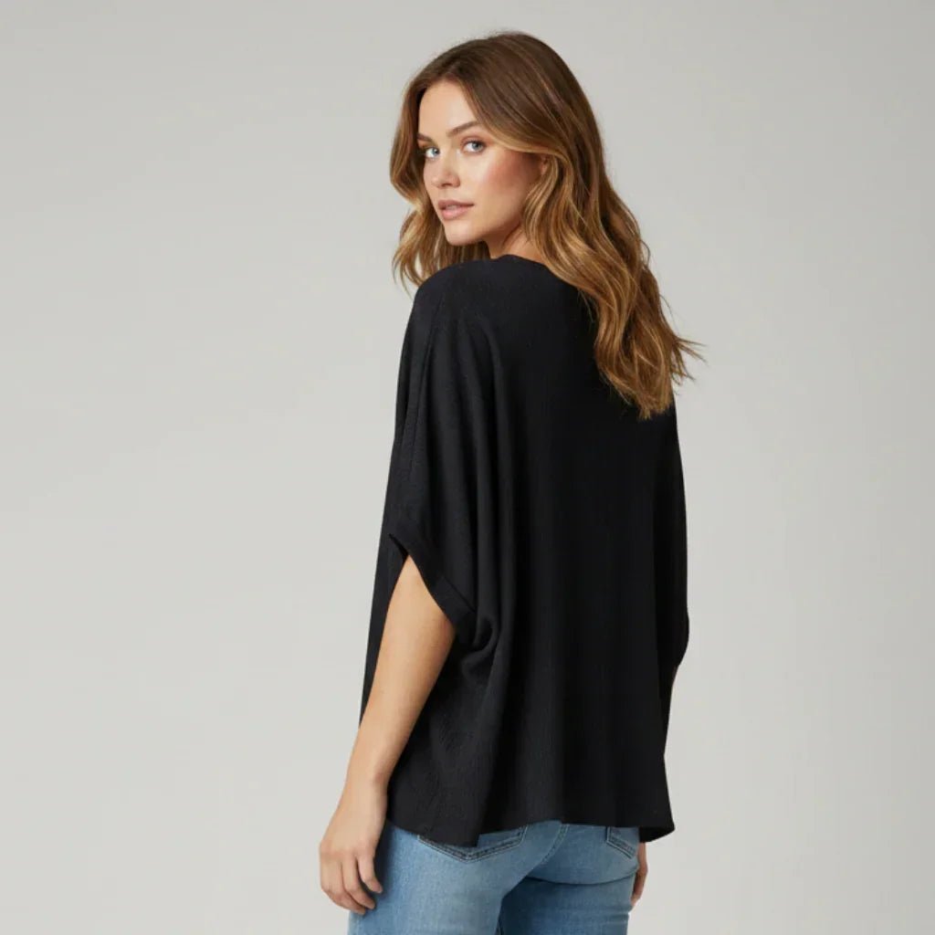 Black C'est Elle women's flowy blouse with a loose fit, elegant casual design, perfect for stylish and comfortable everyday wear.