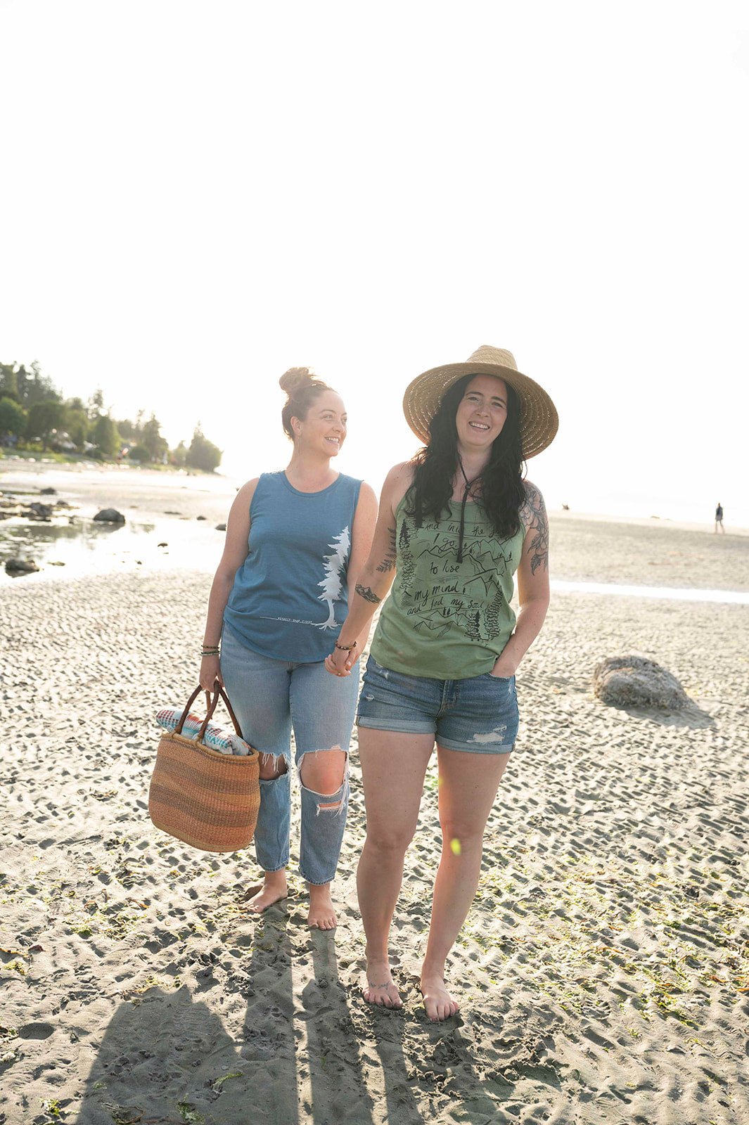 Women's Heather Teal Relaxed Tank Top by KINDRED COAST, casual sleeveless top with a comfortable fit and soft fabric.