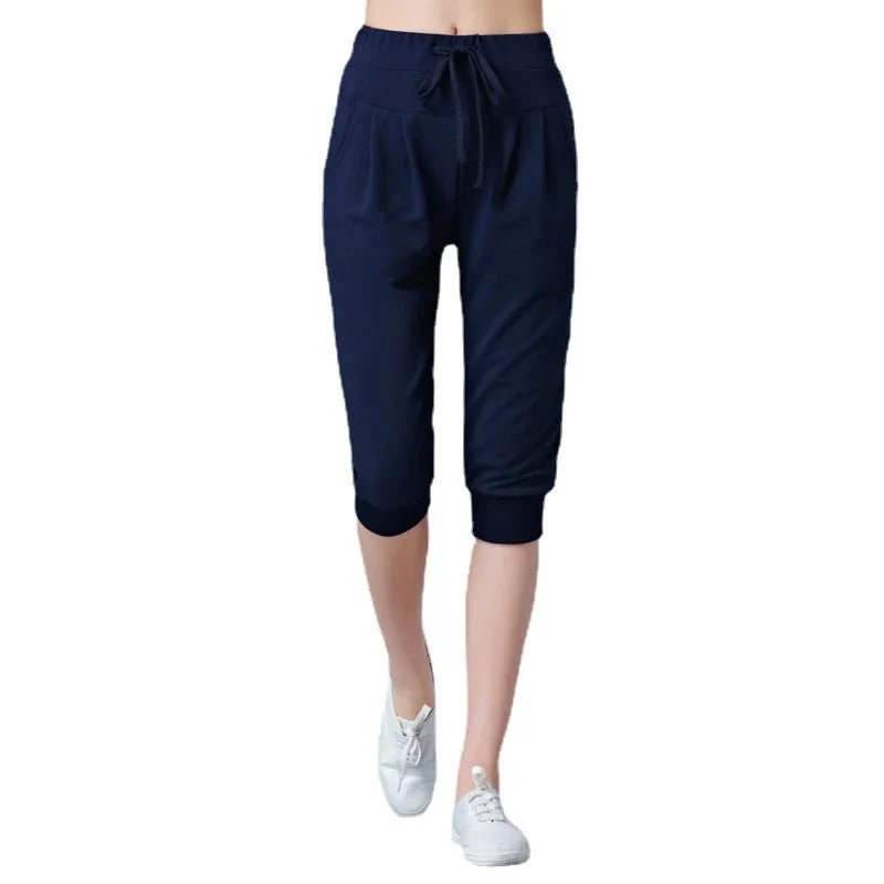 Women's high waist harem jogger capri pants by TrendLux Wear, loose fit sweatpants with relaxed style and comfort.