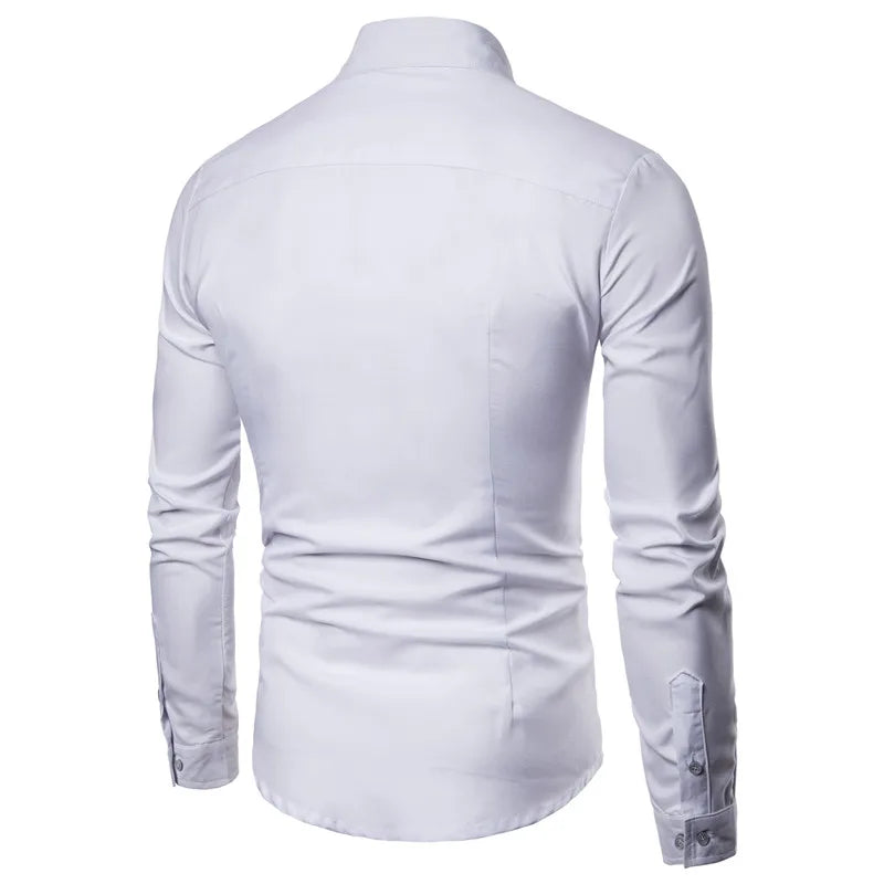 Long sleeve, solid white dress shirt with a turn-down collar and tailored fit, featuring a single breasted closure.