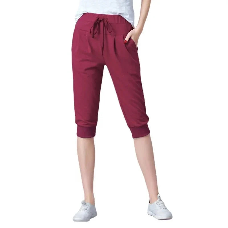Women's high waist harem jogger capri pants by TrendLux Wear, loose sweatpants with relaxed fit and comfortable style.