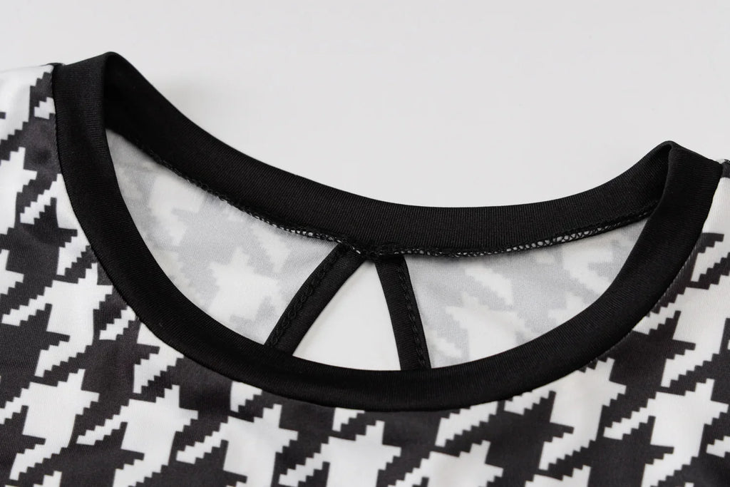 Houndstooth print, black and white, bodycon midi dress with a hollow out detail at the back and O-neck collar.