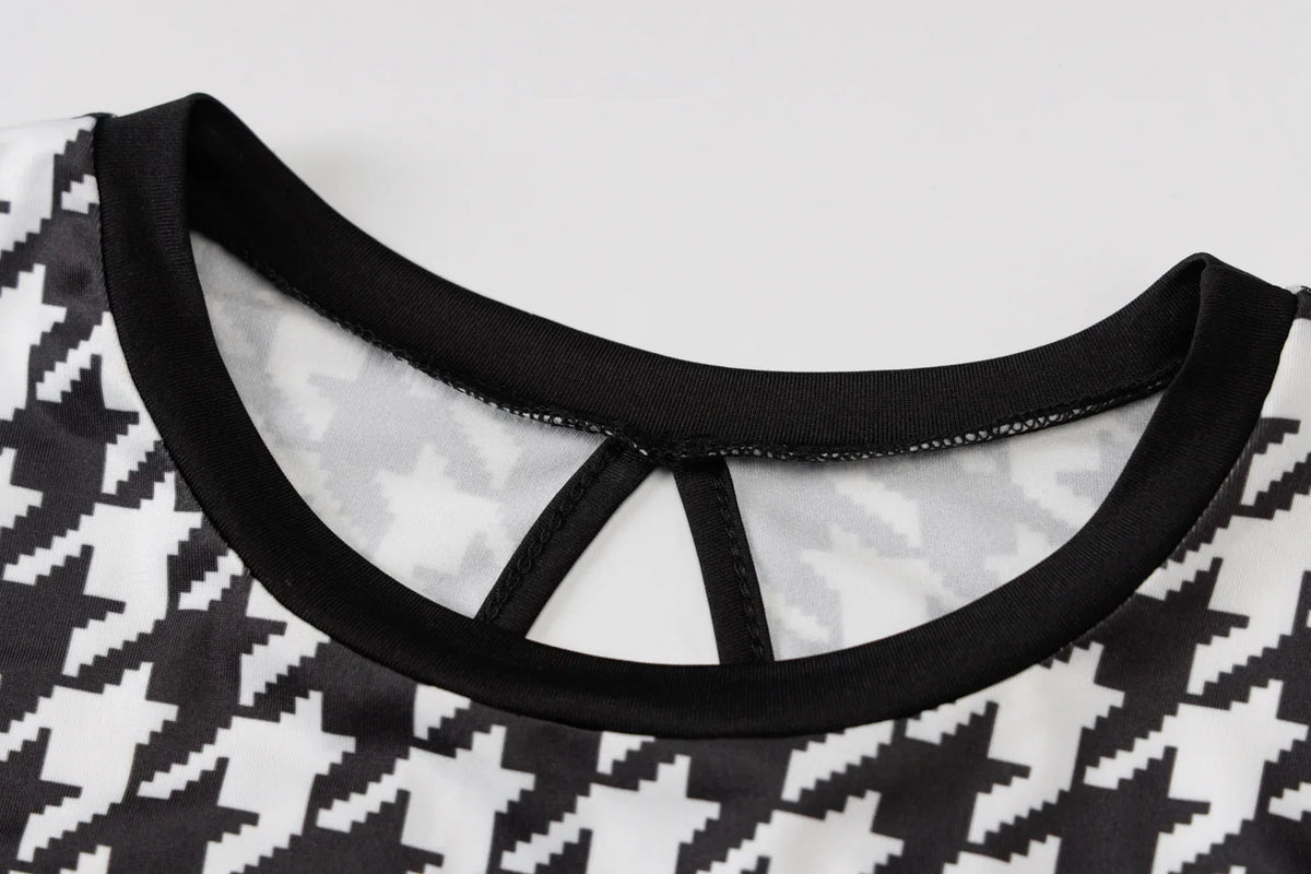 Houndstooth print, black and white, bodycon midi dress with a hollow out detail at the back and O-neck collar.