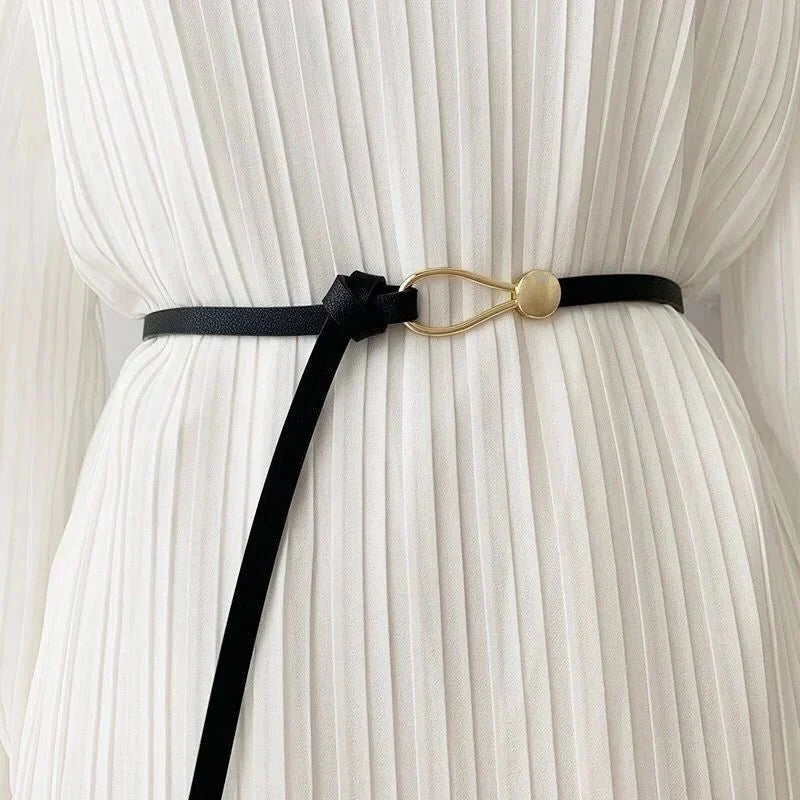 Women's thin bow knotted belt by TrendLux Wear, featuring a stylish bow knot and sleek design for fashionable waist accents.