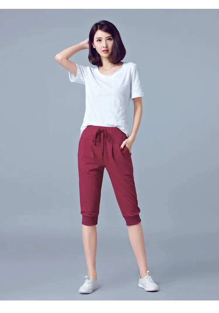 Women's high waist harem jogger capri pants by TrendLux Wear, featuring loose fit and comfortable sweatpant style.