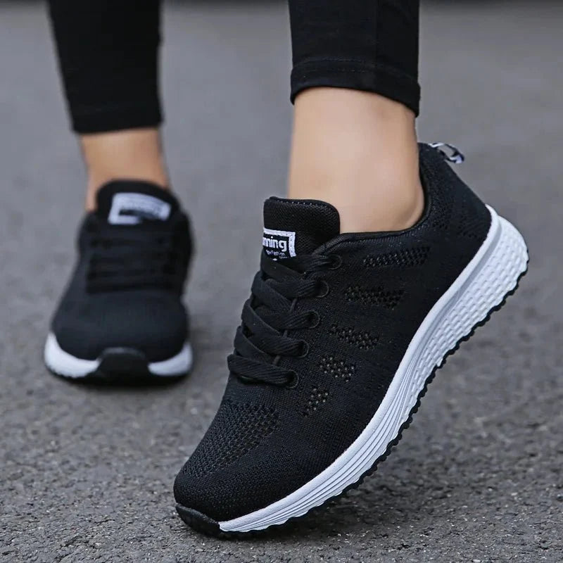 Women's breathable mesh sneakers by TrendLux Wear, lightweight flat walking shoes for gym and everyday activity.