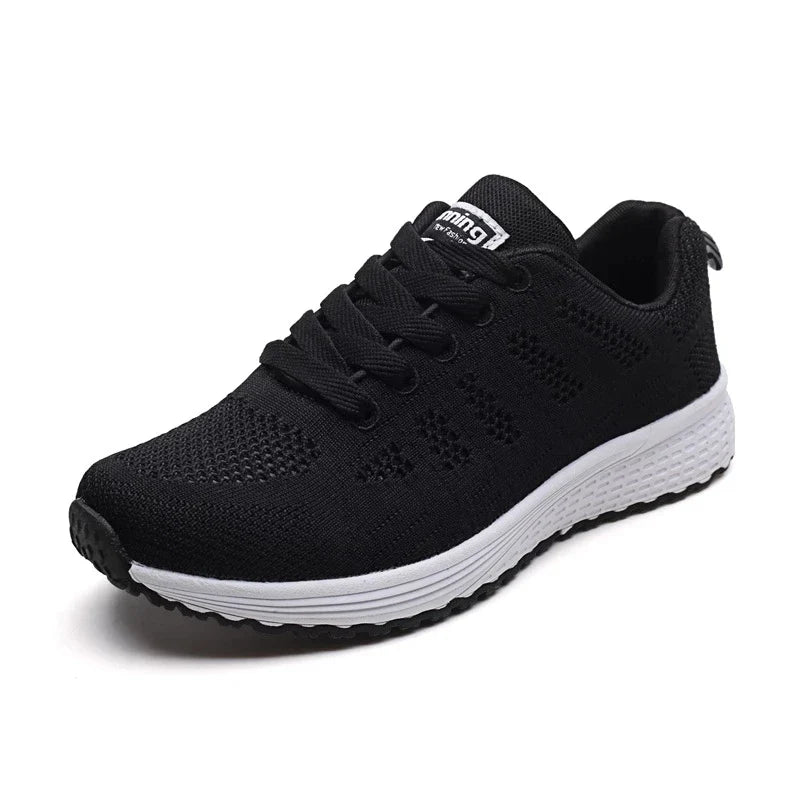 Women's breathable mesh sneakers by TrendLux Wear featuring lightweight flat design ideal for walking, gym, and everyday wear.