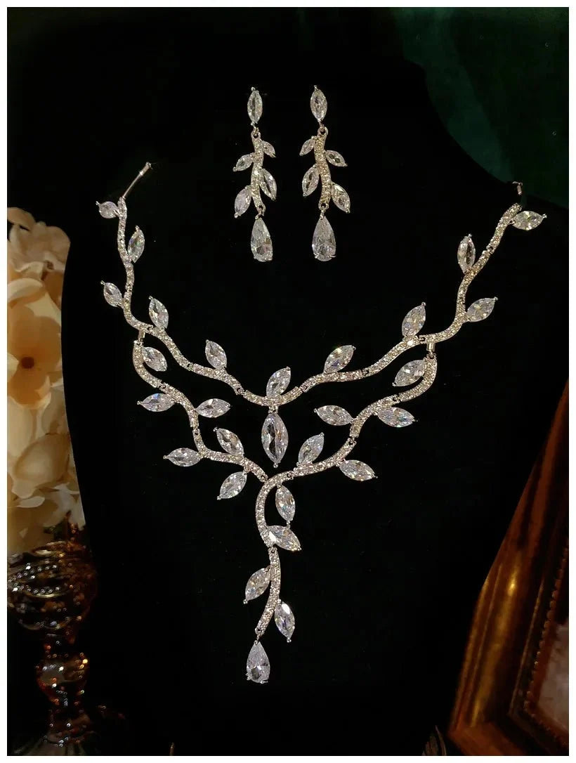Sterling silver floral jewelry set for women by TrendLux Wear, featuring intricate flower designs in a stylish jewelry ensemble.