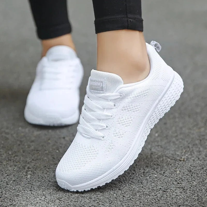 Women's breathable mesh sneakers by TrendLux Wear, lightweight flat walking shoes suitable for gym and everyday wear.
