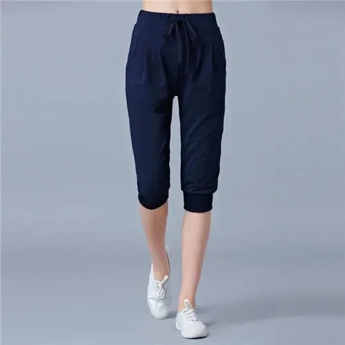 Women's high waist harem jogger capri pants by TrendLux Wear, loose fit sweatpants with relaxed, comfortable style.