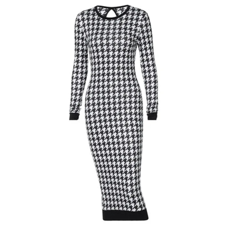 Houndstooth print long sleeve midi dress in black and white with a hollow out back detail. Bodycon fit and knee-length.