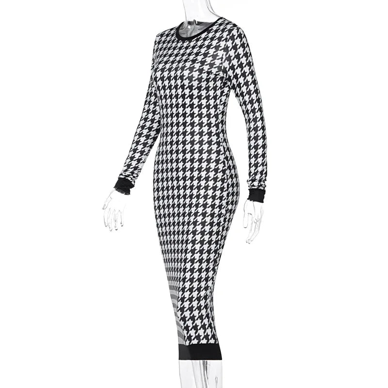 Houndstooth print long sleeve bodycon midi dress in black and white, featuring a slim fit and hollow out details.