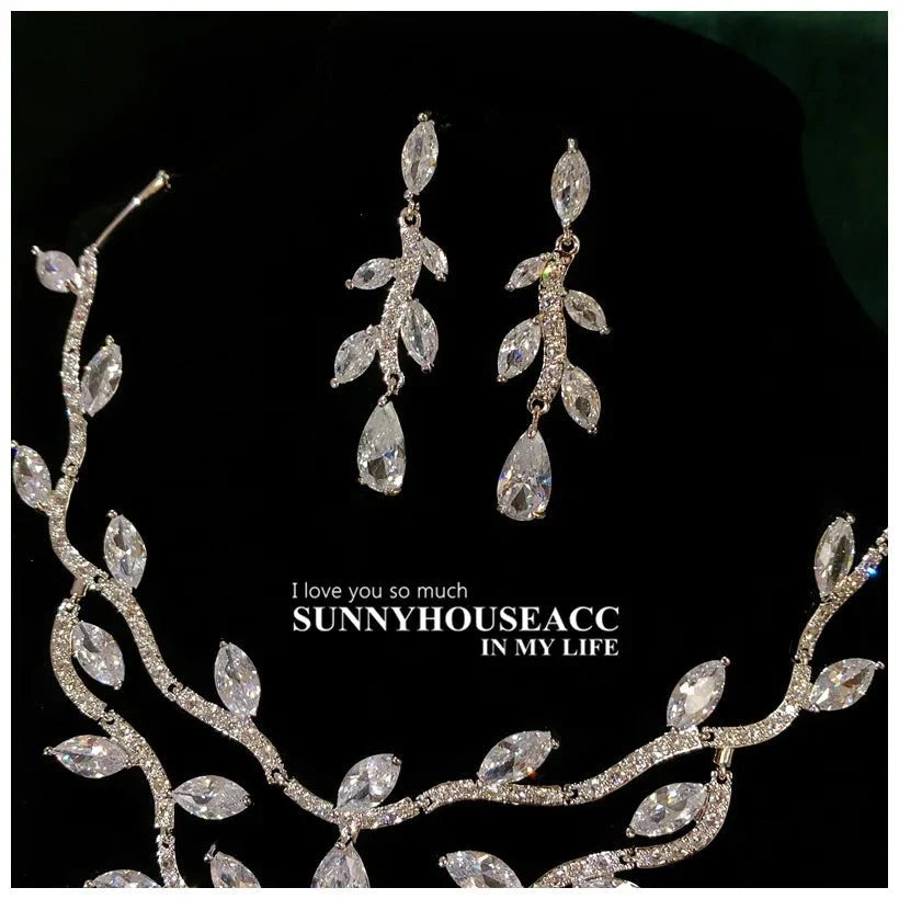 Women's S925 Sterling Silver floral jewellery set featuring intricate flower designs, perfect for elegant accessories by TrendLux Wear.
