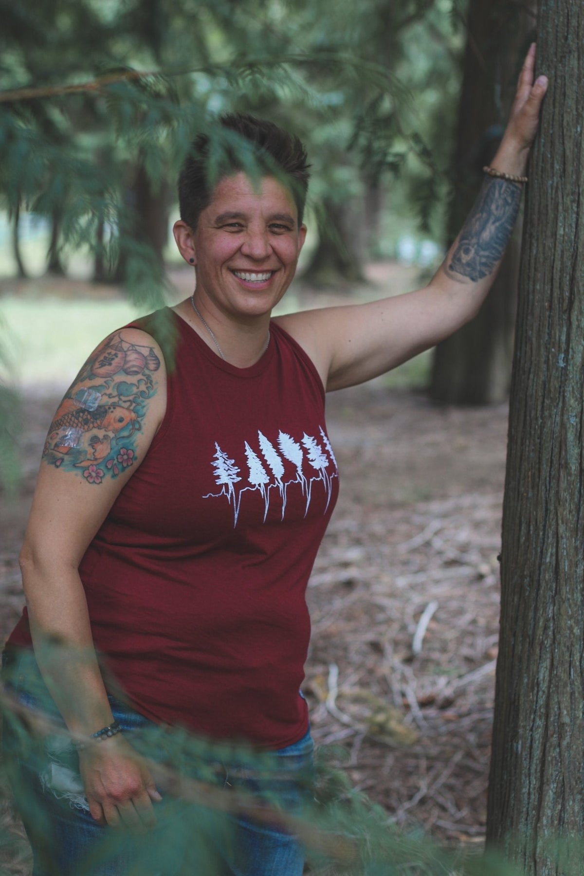 Women's relaxed bamboo tank top by KINDRED COAST, showcasing lightweight, breathable fabric and a casual fit.
