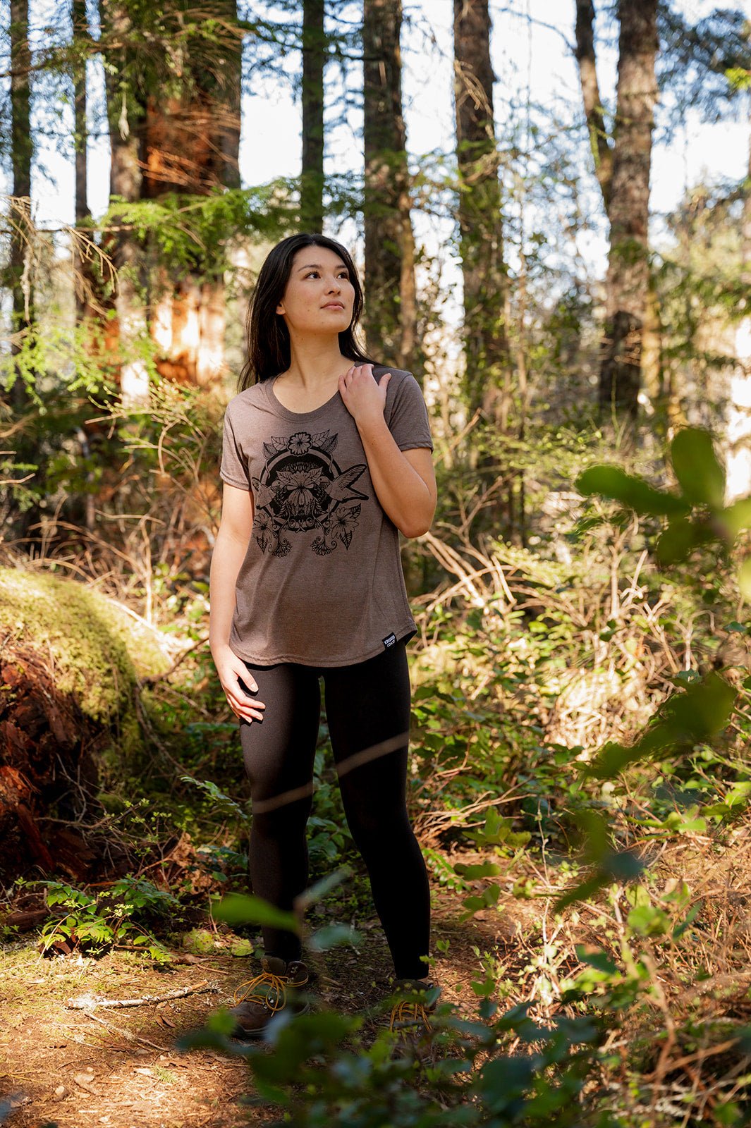 Hummingbird women's eco tee by Kindred Coast featuring a colorful hummingbird graphic on soft, sustainable fabric.