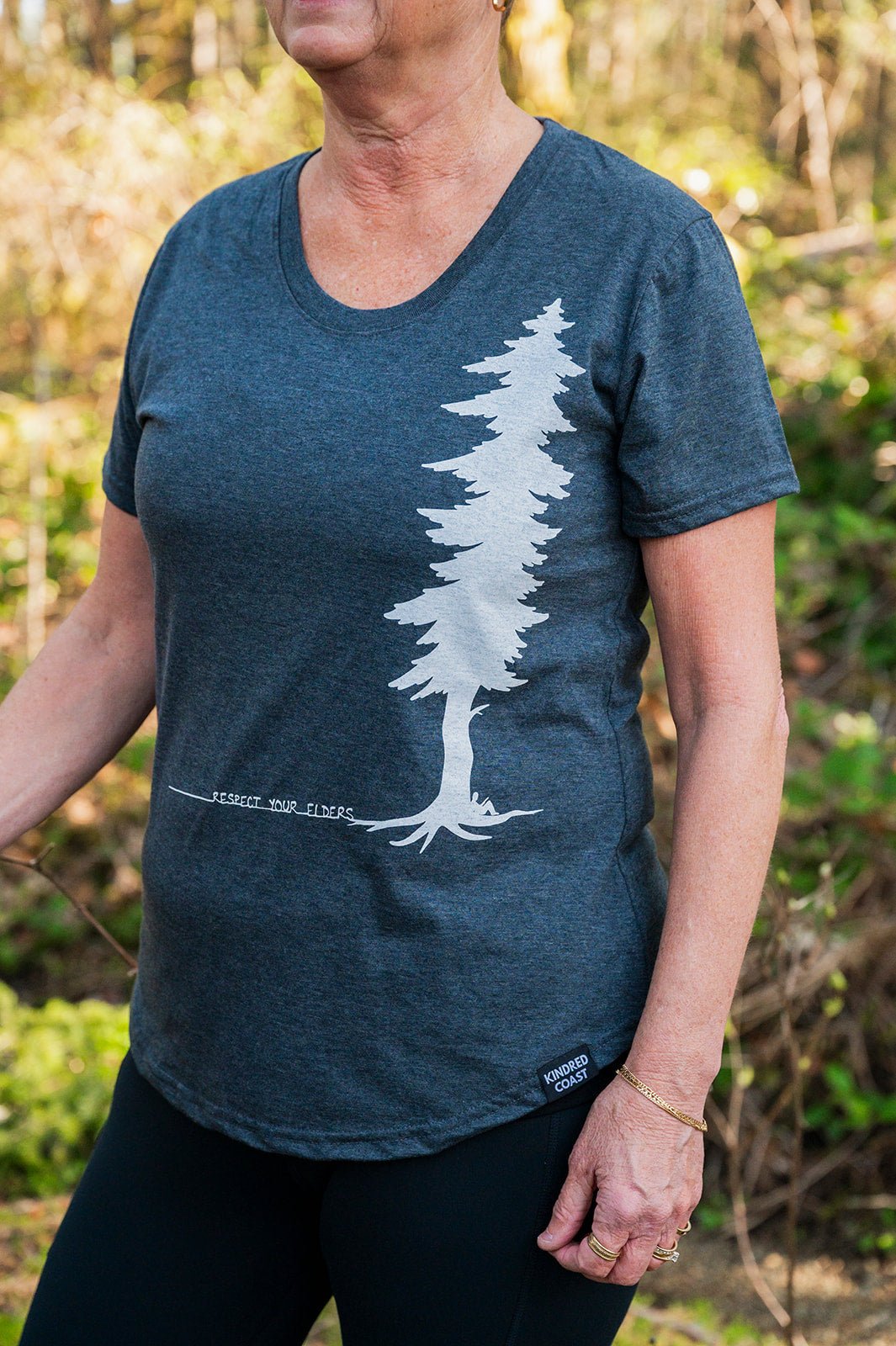 Women’s eco-friendly T-shirt from KINDRED COAST featuring a comfortable fit and sustainable fabric, shown in a casual style.