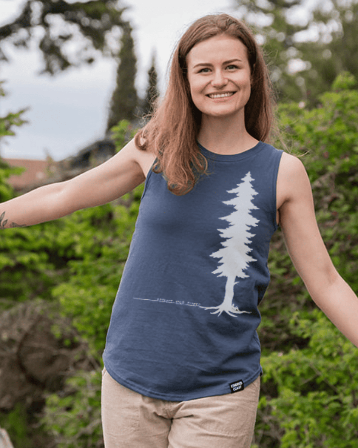 Women's relaxed organic cotton tank top by KINDRED COAST, featuring a comfortable fit and natural fabric in soft, breathable material.