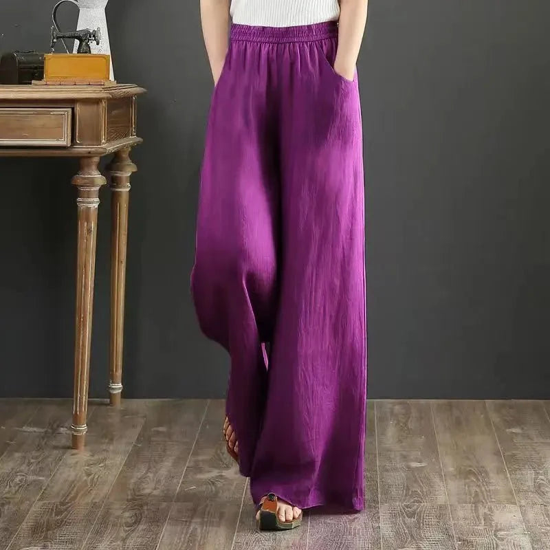 Women's linen cotton casual trousers with elastic waist and wide-leg fit from TrendLux Wear, shown in a relaxed, comfortable style.