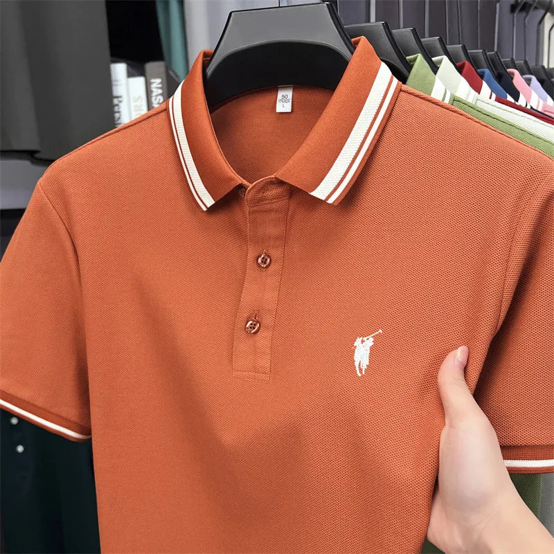 Short sleeve polo shirt in rich rust color with white striped collar and embroidered pony logo. Casual style and breathable fabric.