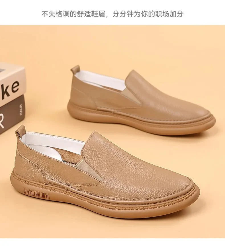 Men's genuine leather casual loafers by TrendLux Wear, slip-on flat shoes in solid color with breathable design.
