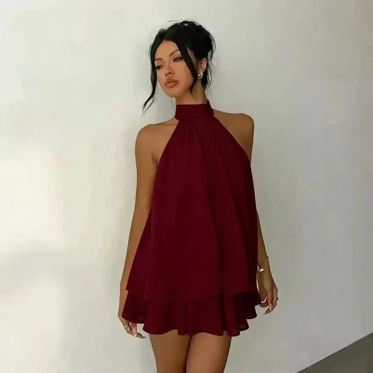 Women's polyester backless slim-fit A-line beach dress by The Glow Sanctuary, featuring a stylish backless design and flattering silhouette.