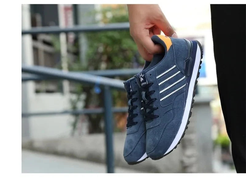 Men's luxury suede running sneakers by TrendLux Wear featuring breathable, anti-odor sport shoes in a sleek design.