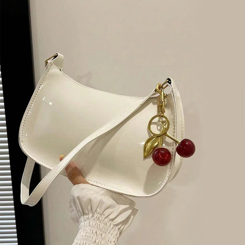 TrenLux Wear Women's Pure Leather Solid Colour Cherry Pendant  Bag TrenLux Wear