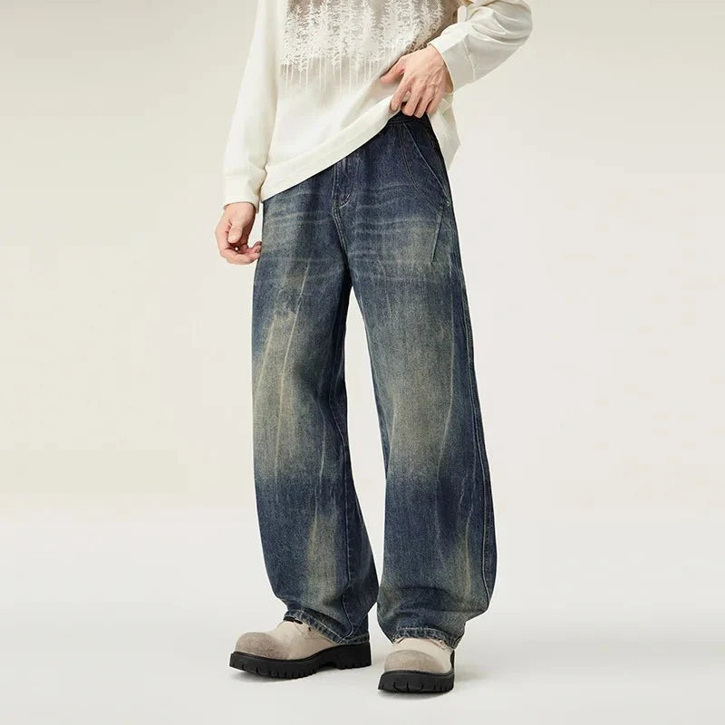 Men's distressed loose straight leg jeans by TrendLux Wear, casual denim pants with a relaxed fit and stylish distressed detailing.