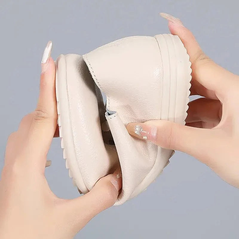 Women’s lace-up leather loafers by TrendLux Wear, stylish shoes with a sleek design and classic lace-up detail.