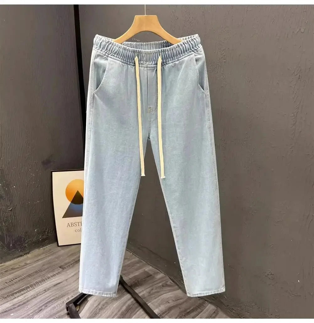 Men's vintage loose straight leg jeans from TrendLux Wear, made of durable cotton denim, ideal for casual spring and autumn wear.