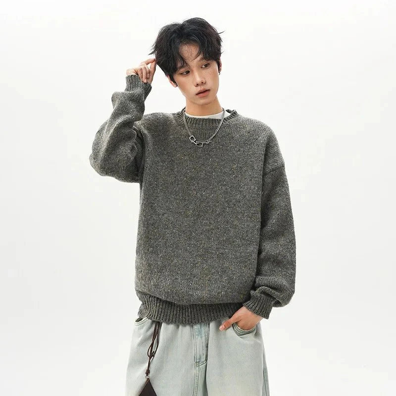 Men's oversized round neck pullover sweater from TrendLux Wear in warm polyester knit, available in three colors.