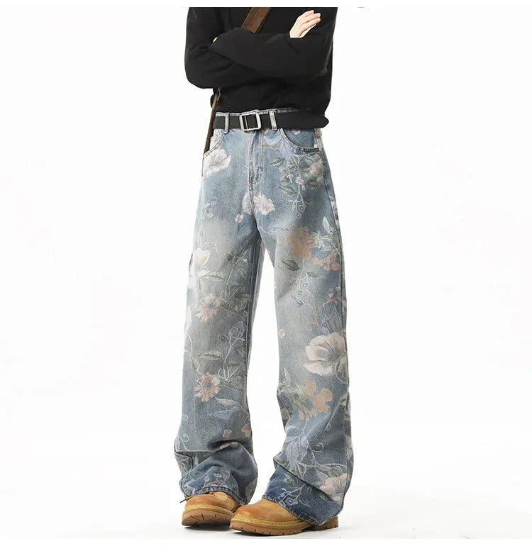 Men's retro floral print jeans from TrendLux Wear featuring loose wide-leg denim and a hip-hop style for casual wear.
