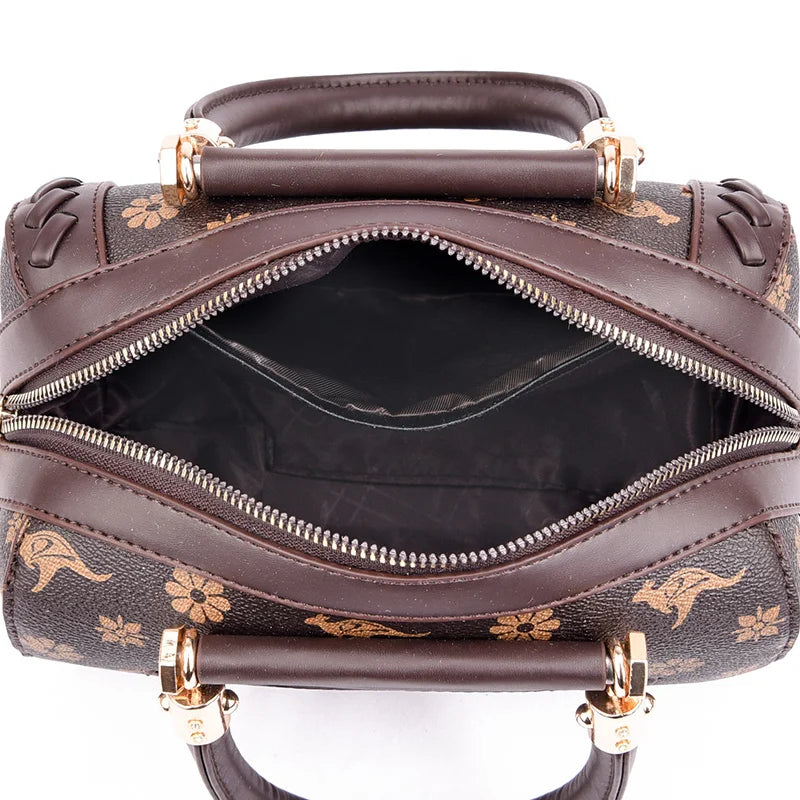 Brown semi-woven women's luxury handbag with floral pattern, top zipper opening, and interior pockets for organization.