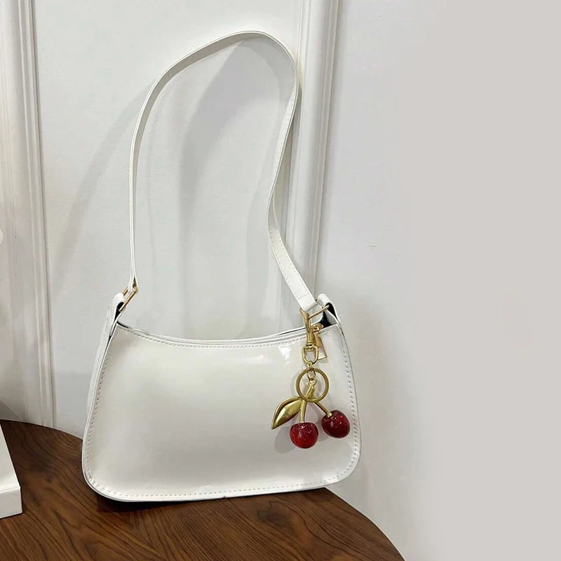TrenLux Wear Women's Pure Leather Solid Colour Cherry Pendant  Bag TrenLux Wear