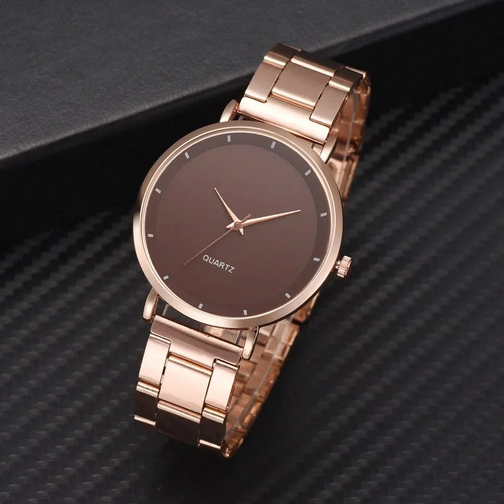 Women’s rose gold stainless steel TrendLux Wear watch with a sleek round face and elegant design.