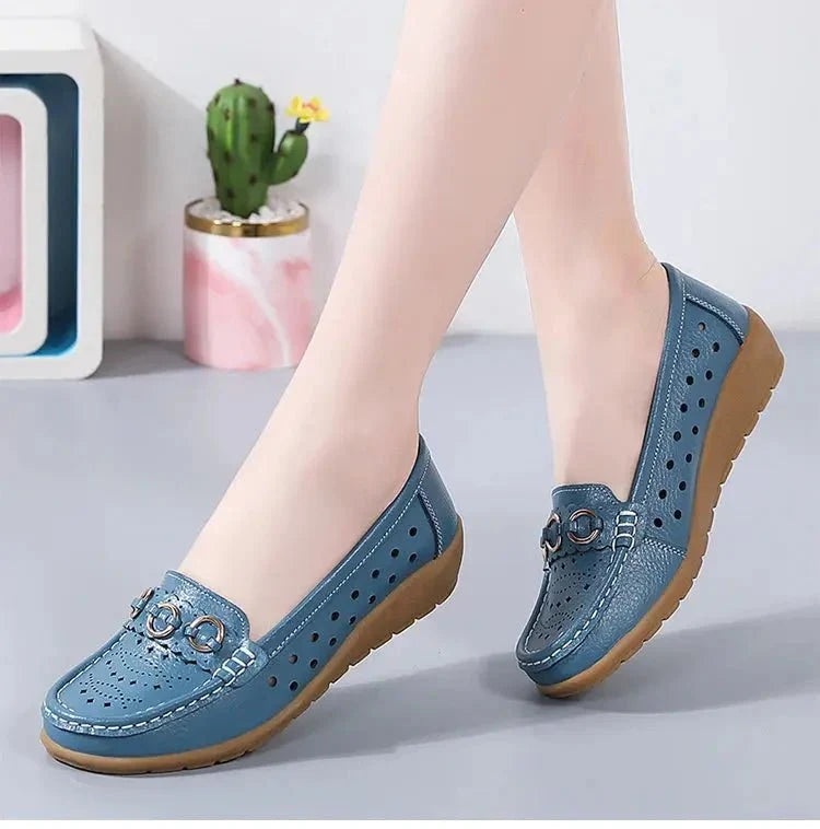 Women's breathable hollow wedge loafer pumps by TrendLux Wear, featuring a stylish design and comfortable slip-on shoes.