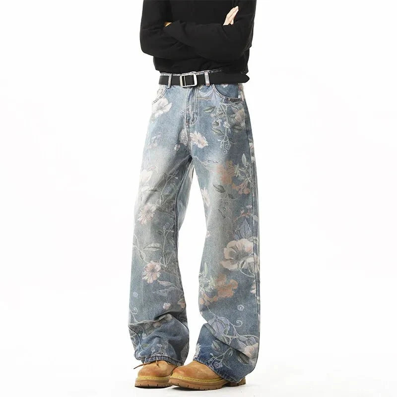 Men's retro floral print jeans by TrendLux Wear featuring loose wide-leg denim, ideal for casual hip-hop style.