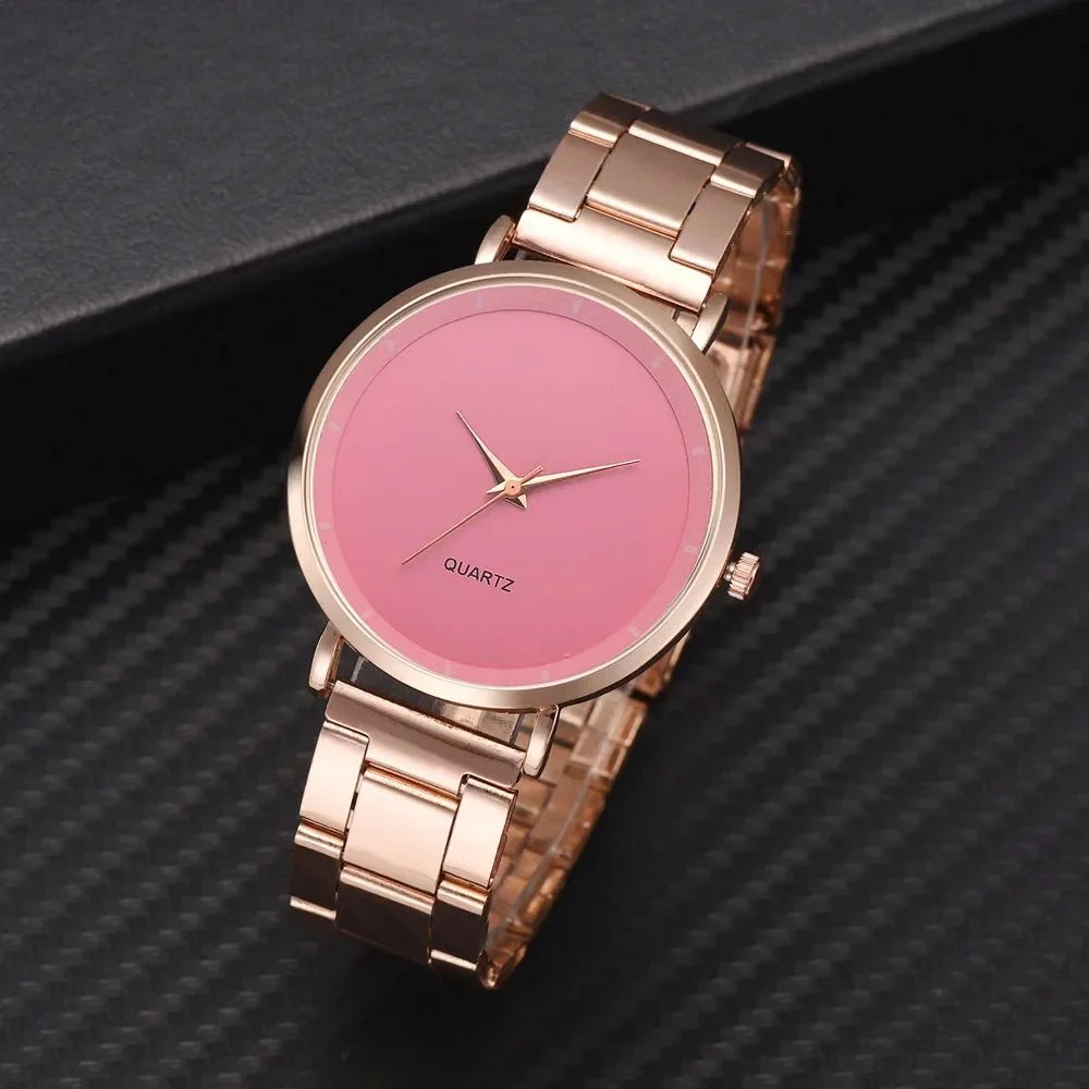 Women's rose gold stainless steel TrendLux Wear watch with a sleek round face and elegant design.