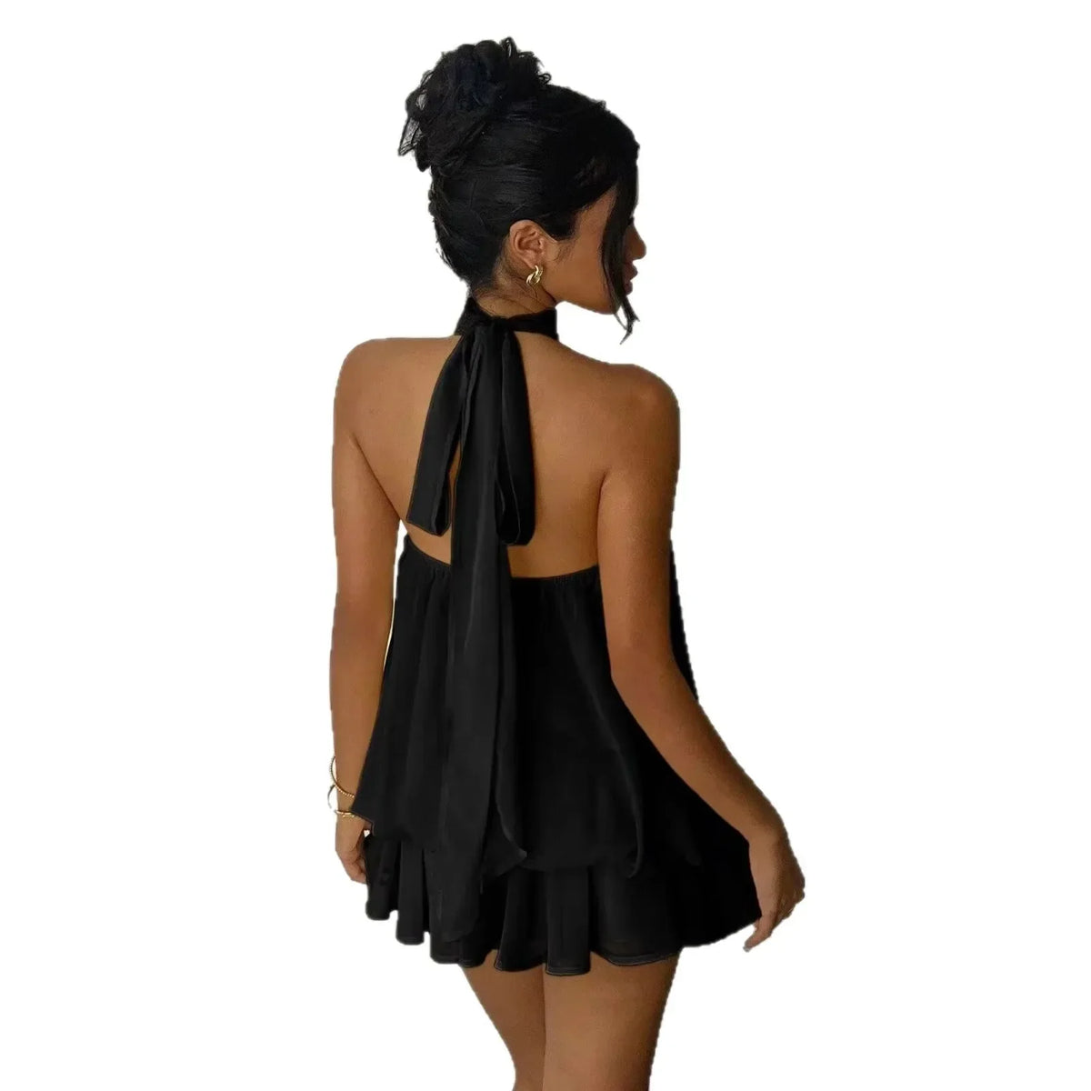 Women's backless slim-fit A-line beach dress by The Glow Sanctuary, showing lightweight polyester fabric and stylish design.
