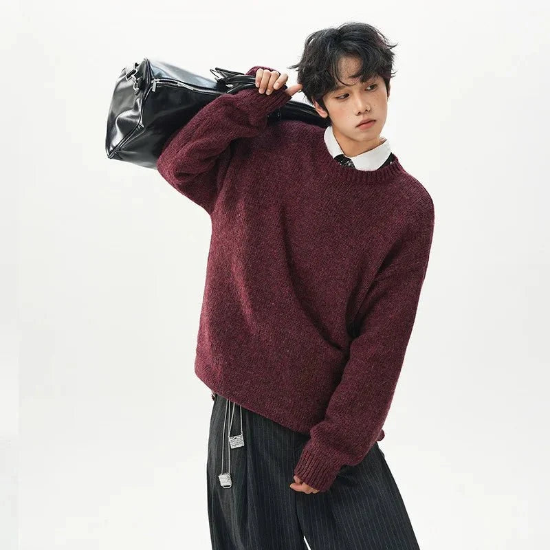 Men's oversized round neck pullover sweater by TrendLux Wear in warm polyester knit, available in three colors.