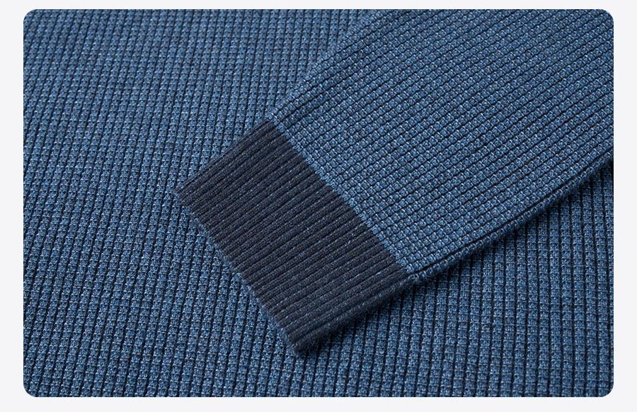 Men's oversized waffle-knit crewneck sweater in Heather Denim Blue by TrendLux Wear, casual pullover with textured knit fabric.
