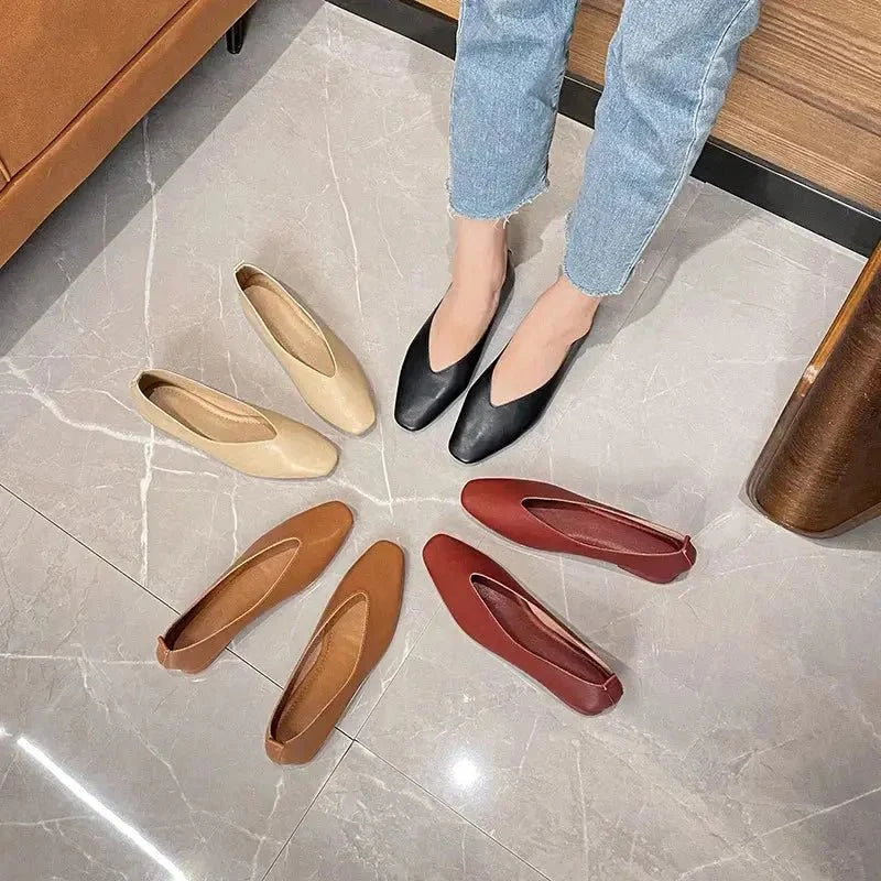 Women's round-toe leather loafer flats by TrendLux Wear, showcasing sleek design and comfortable slip-on shoes.