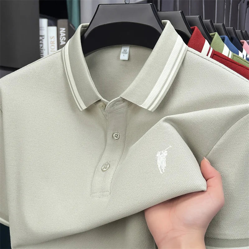 Light beige short sleeve polo shirt made of 100% cotton, featuring a classic collar and pony embroidery detail.