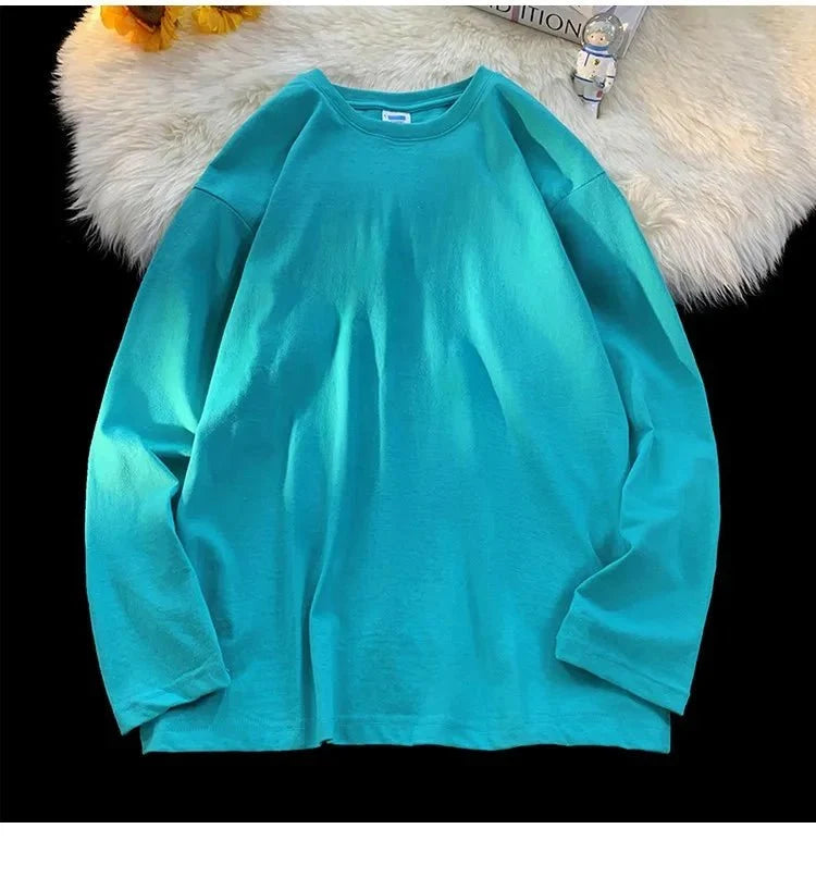Unisex oversized long sleeve blank T-shirt from My Store 5, available in 18 colors and sizes S to 3XL, laid flat.