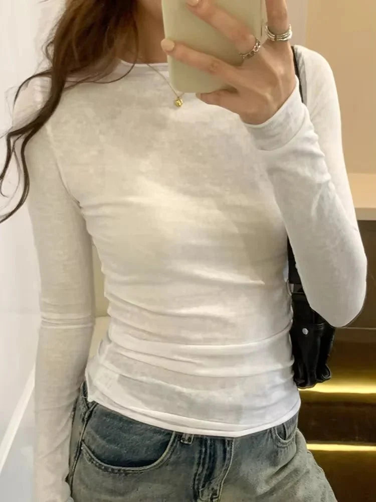 TrenLux Wear women's long sleeve O-neck T-shirt in solid color, slim fit, casual streetwear top for spring and autumn.