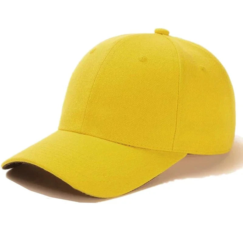 Unisex plain baseball cap by TrendLux Wear, adjustable structured hat available in 24 colors, shown in black with curved brim.