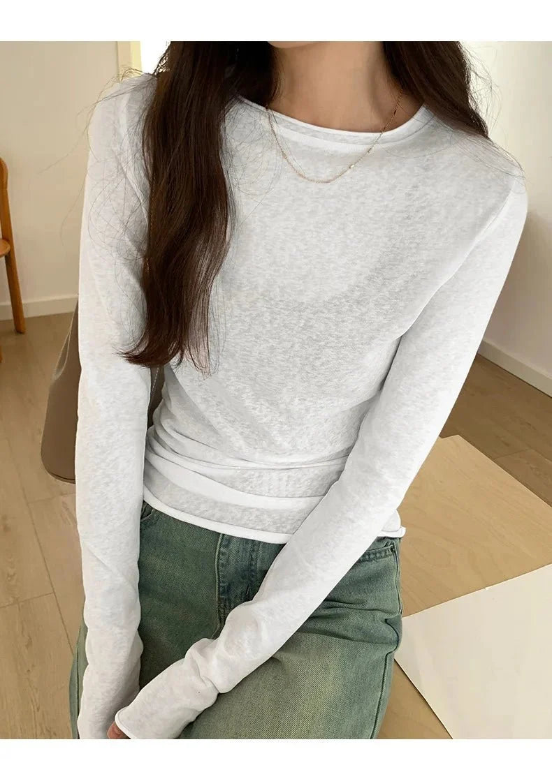 TrenLux Wear women's long sleeve O-neck T-shirt, slim fit, solid color, casual streetwear top for spring and autumn.